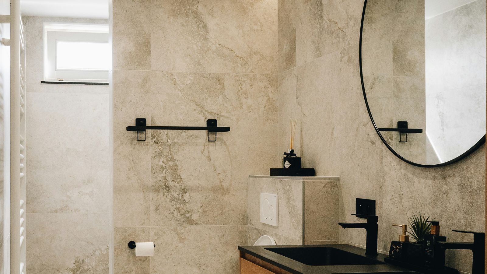 Modern fitted bathroom with double vanity and walk-in shower